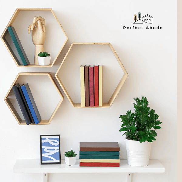 balancing books and decorative items